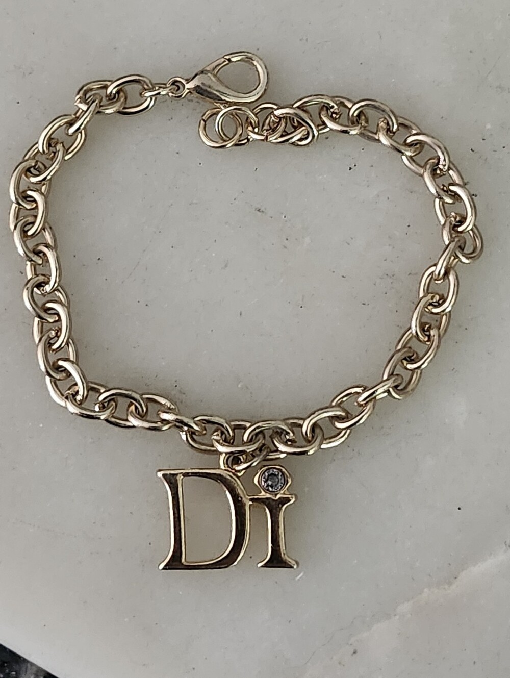 Diamonds International Gold-Tone 'Di' Charm Chain Bracelet